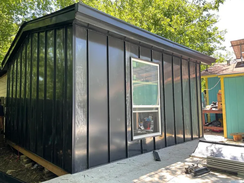 Black standing seam metal wall panels for Roof Inspection in Auburn